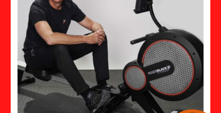 Roger Black on a rower with festive decorations