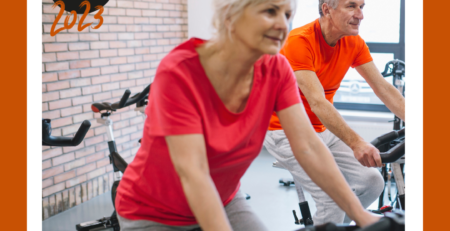 Man and Women on exercise equipment.