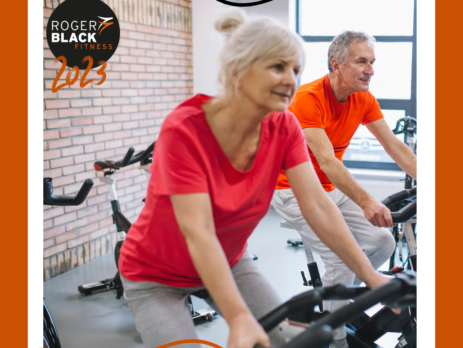 Man and Women on exercise equipment.